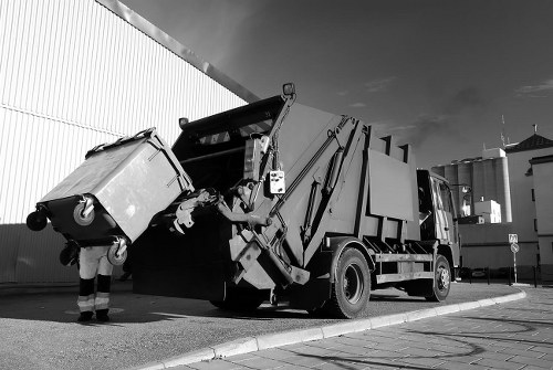 Muck Away Services team working on waste removal